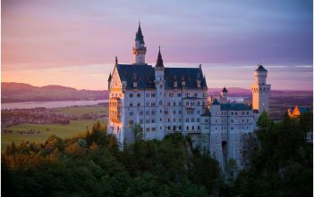 Que visiter près de Munich en Bavière pour les amoureux d’histoire? Chateau Neuschwanstein coucher de soleil en Baviere